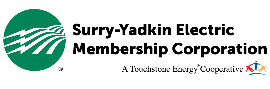 Surry-Yadkin E.M.C. Logo. Image text says: Surry-Yadkin Electric Membership Corporation. A Touchstone Energy Cooperative.